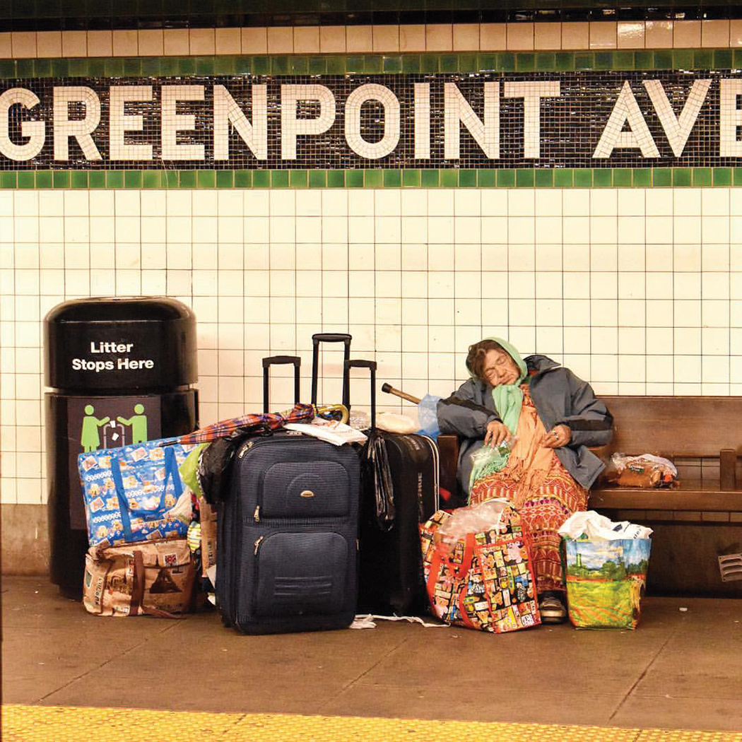 A homeless woman at the Greenpoint Ave. G train station in Brooklyn. 