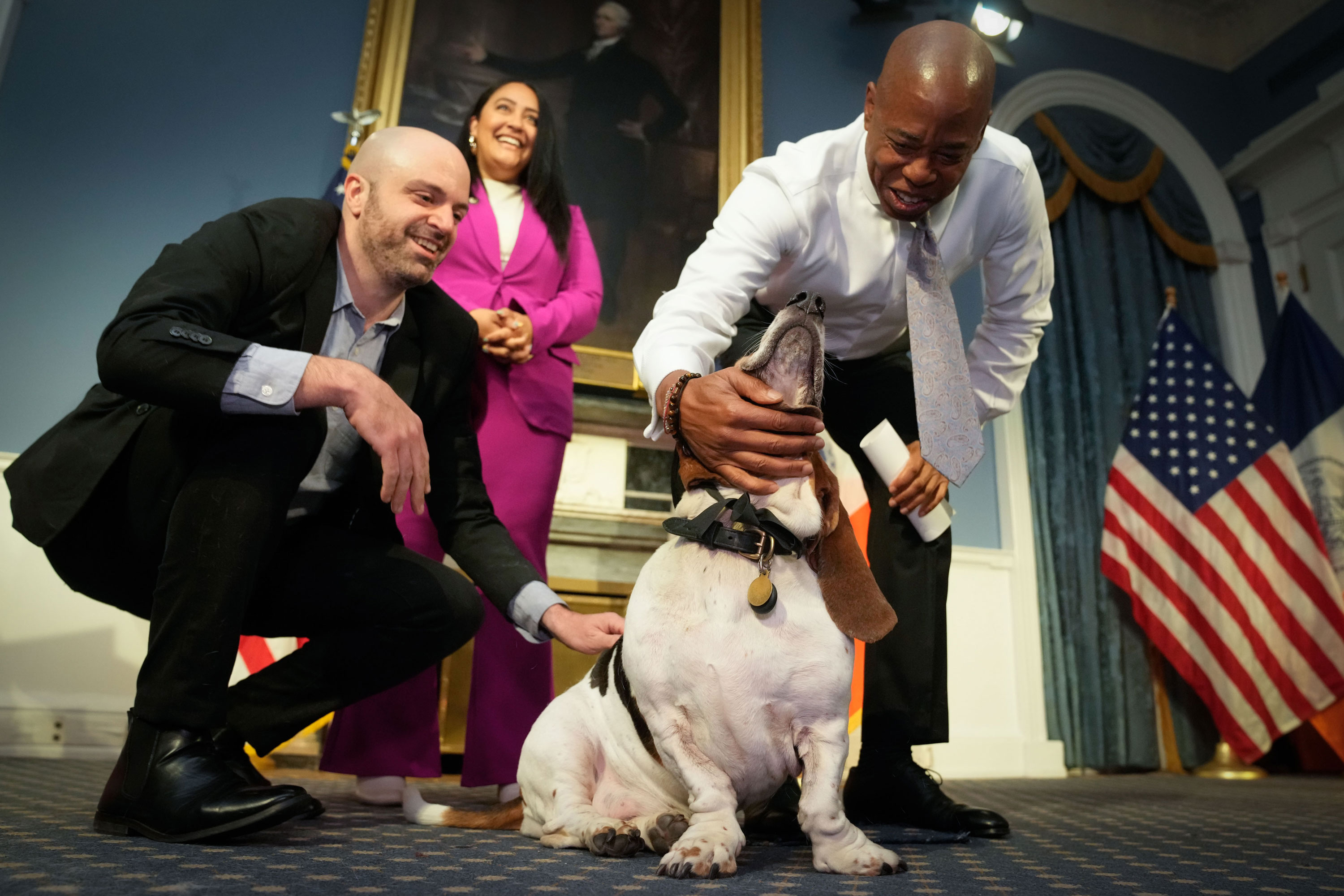 Mayor Eric Adams greets the city’s first dog mayor, Sally, in 2023.