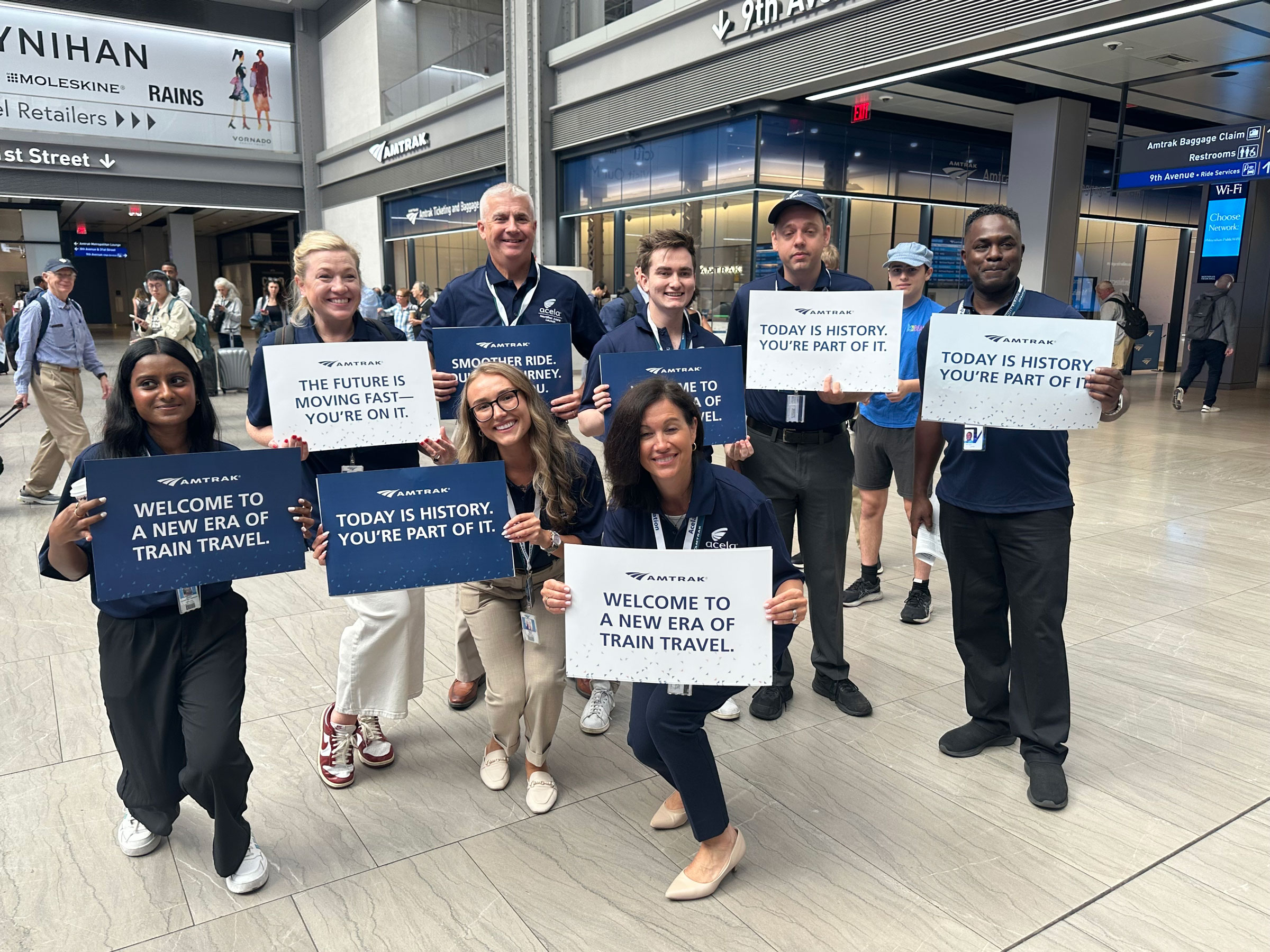 Amtrak employees ready to welcome the arrival of Amtrak’s new Acela train at Moynihan Train Hall in Penn Station.