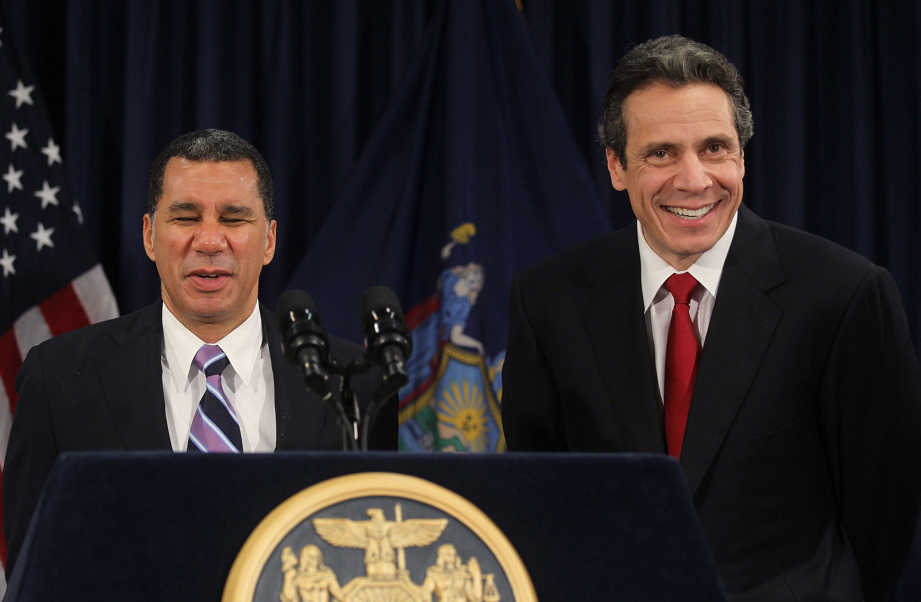Then-Gov. David Paterson holds a joint press conference with Gov.-elect Andrew Cuomo in November 2010.