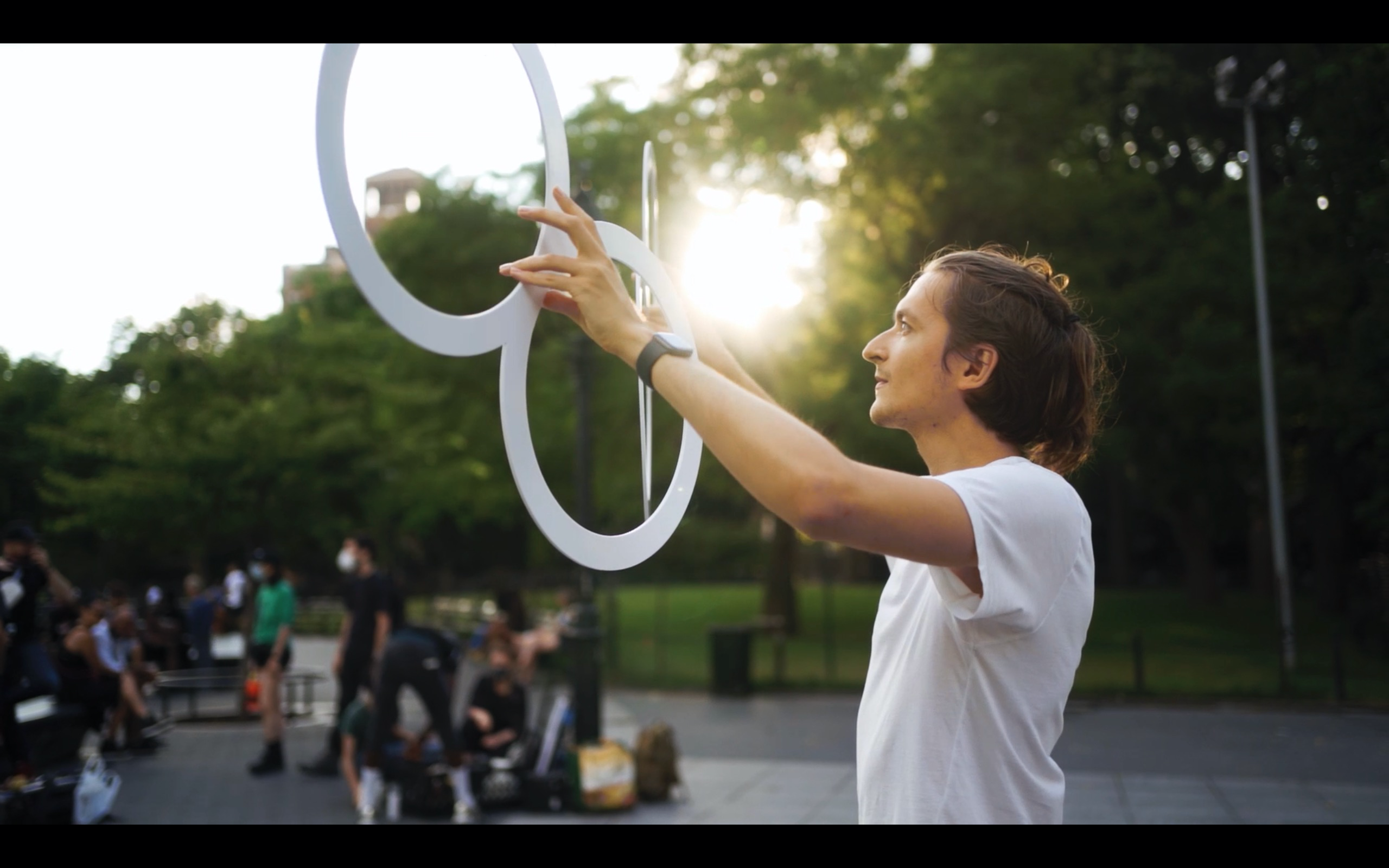 Kharlamov performing at Washington Square Park last month, earning only $30-$40 per evening in front of  a limited audience. 