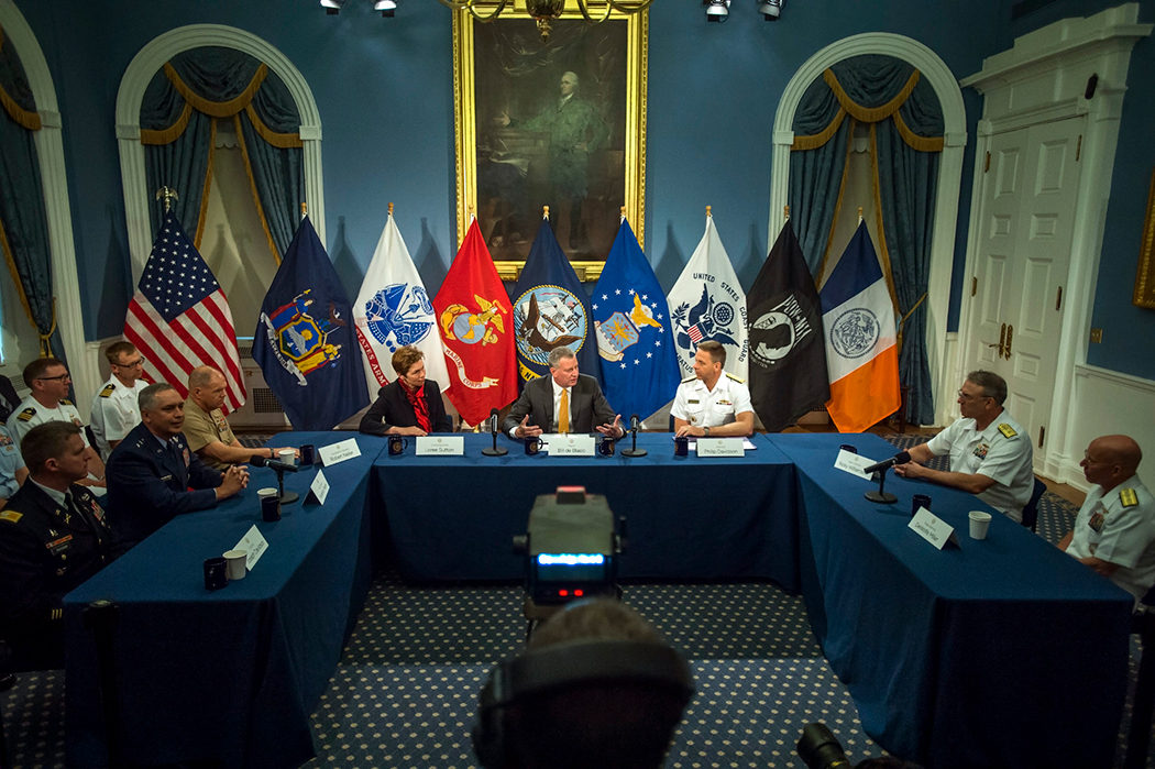 New York City Mayor Bill de Blasio hosts a roundtable with senior military officers. New York City Mayor Bill de Blasio hosts a roundtable with senior military officers.