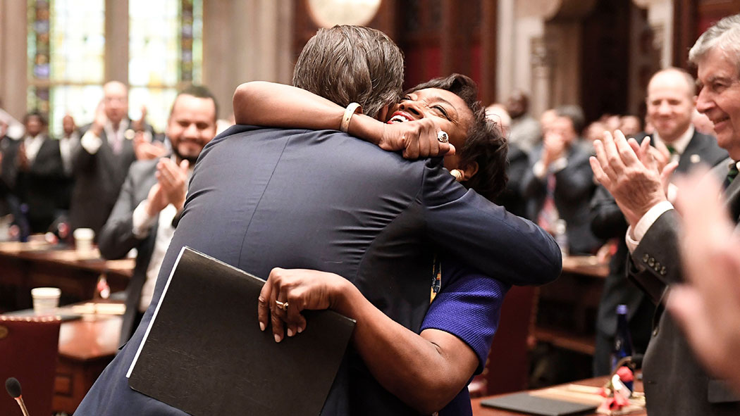 Gianaris embraces state Senate Leader Andrea Stewart-Cousins after helping her gain the majority.