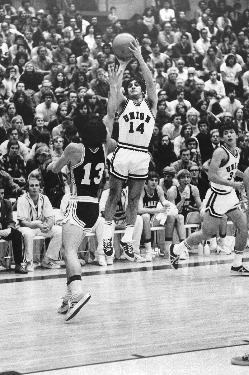 State Sen. Jim Tedisco playing basketball