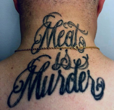Justin Brannan's neck tattoo