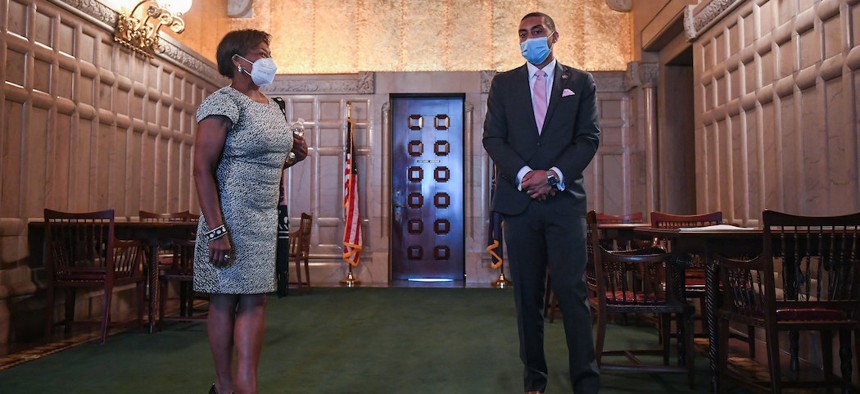 NYS Senate Majority Leader Andrea Stewart-Cousins and NYS Senator Jamaal Bailey discuss legislation outside the NYS Senate chamber.