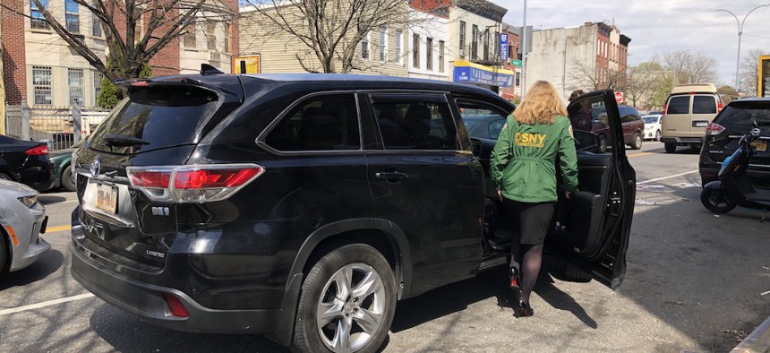 DSNY Commissioner Kathryn Garcia getting into her chauffeured car.