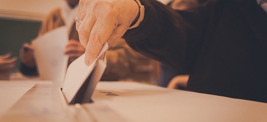 Person casting a vote