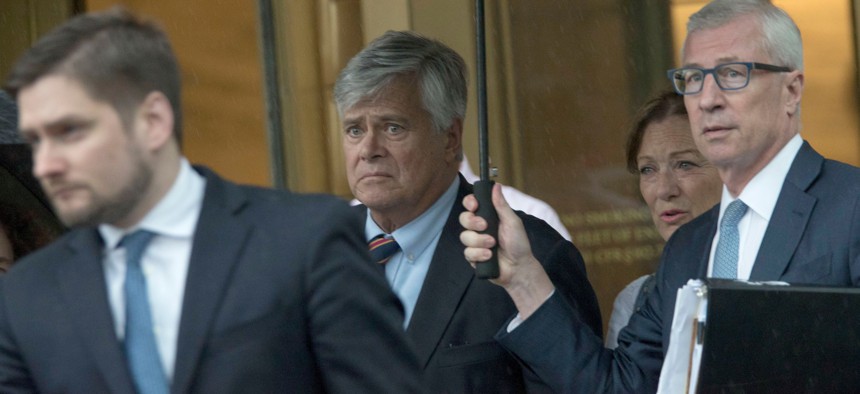 Dean Skelos and his wife Gail leave federal court in New York.