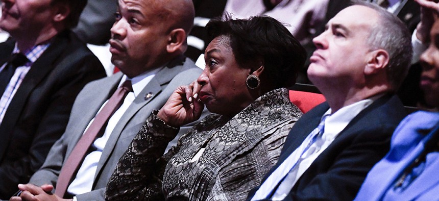 State Comptroller Thomas DiNapoli (right) listens to Gov. Andrew Cuomo's State of the State address alongside Senate Majority Leader Andrea Stewart-Cousins and Assembly Speaker Carl Heastie.