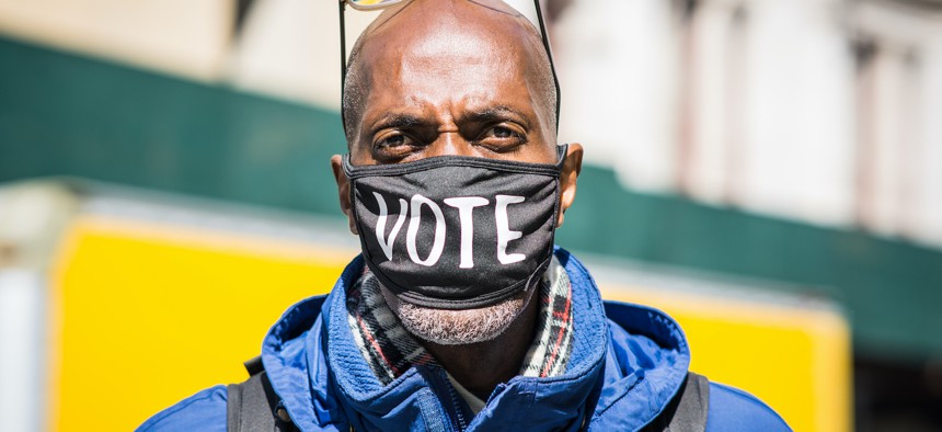 Voters are generally asked to leave attire supporting a candidate on the ballot at home before they vote.