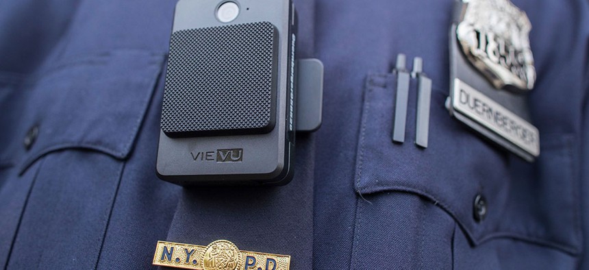 An NYPD officer wearing a department-issued body camera.