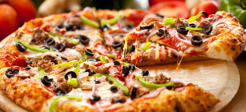 A pizza slice emerges from the pie, and it is a great metaphor for human services nonprofits and their relationship with government procurements.