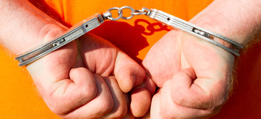 Someone is handcuffed. Might it be a foster youth runaway?