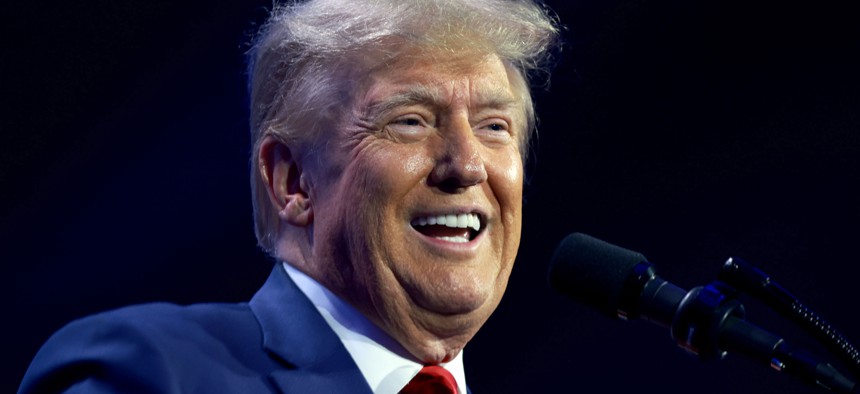 Trump speaks at the Turning Point Action conference as he continues his 2024 presidential campaign in West Palm Beach, Florida.