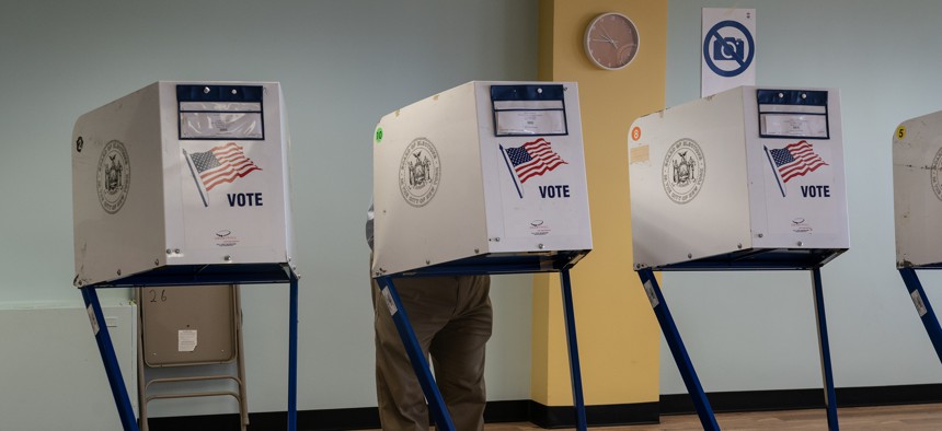 People vote at a polling station in the Bronx on Nov. 8, 2022.