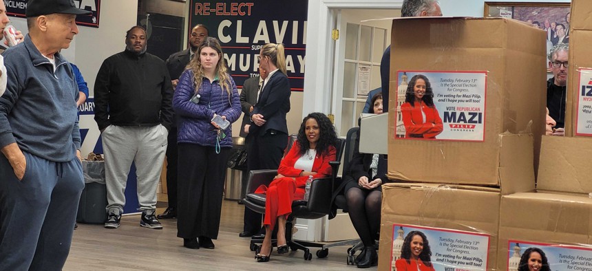 Mazi Pilip attends a watch party for the only debate in the 3rd Congressional District special election.