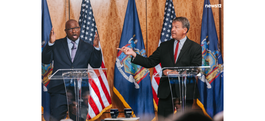 Rep. Jamaal Bowman (left) and Westchester County Executive George Latimer participate in a congressional primary debate hosted by News 12 on May 13, 2024.
