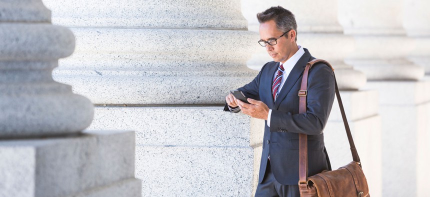 Only the insiders, like the one approximated in this stock photo of a politician, can win.