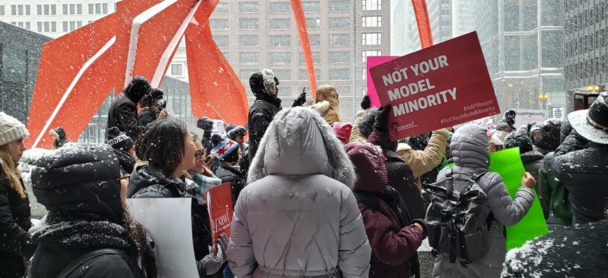 AAPI community members attend the Young Women's March Rally at the Chicago Federal Center Plaza on January 19, 2019.