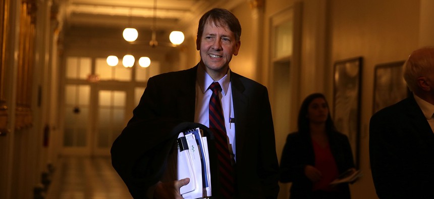 Consumer Financial Protection Bureau Director Richard Cordray arrives at a meeting of the Financial Stability Oversight Council at the Treasury Department on Nov. 16, 2016.