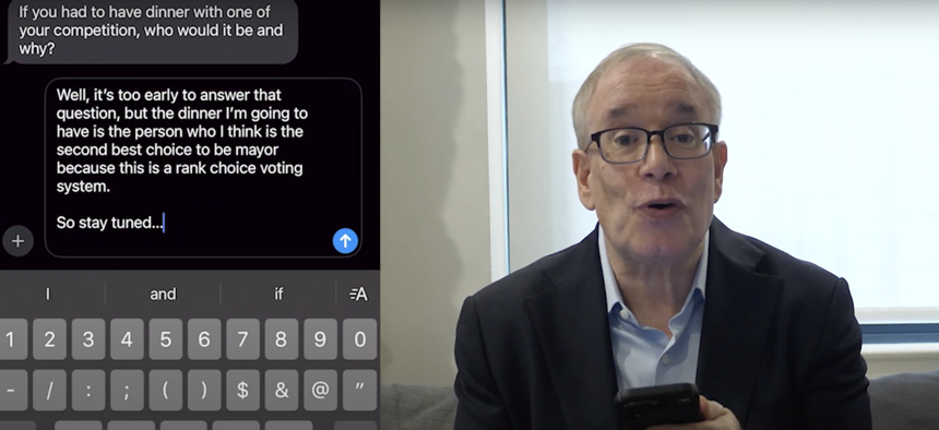 Former New York City Comptroller Scott Stringer answers text messages from voters in a video released by his campaign.