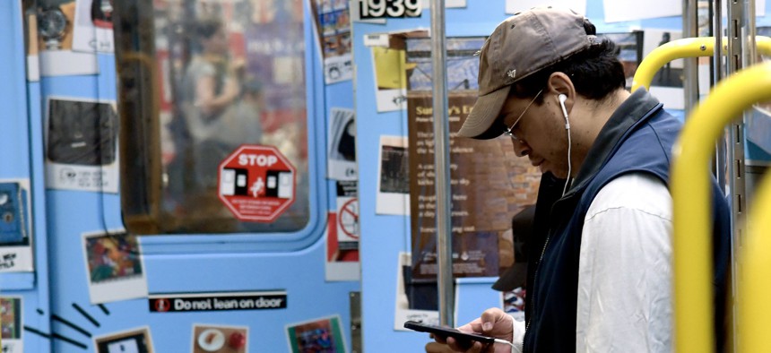 Straphangers can use their cellphones on the 42nd Street shuttle after new 5G wireless service was introduced last year.