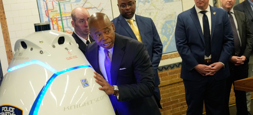 New York City Mayor Eric Adams alongside K5, a robot tested by the NYPD in the subway system during parts of 2023 and 2024.