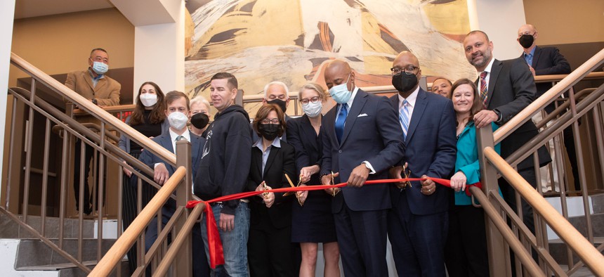 Mayor Eric Adams cuts the ribbon on the Institute for Community Living's supportive housing facility in Brooklyn in 2022.