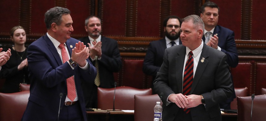 Republican state Sen. Steven Rhoads, center, sponsored a bill that would allow schools to ban trans girls from playing on women’s sports teams.