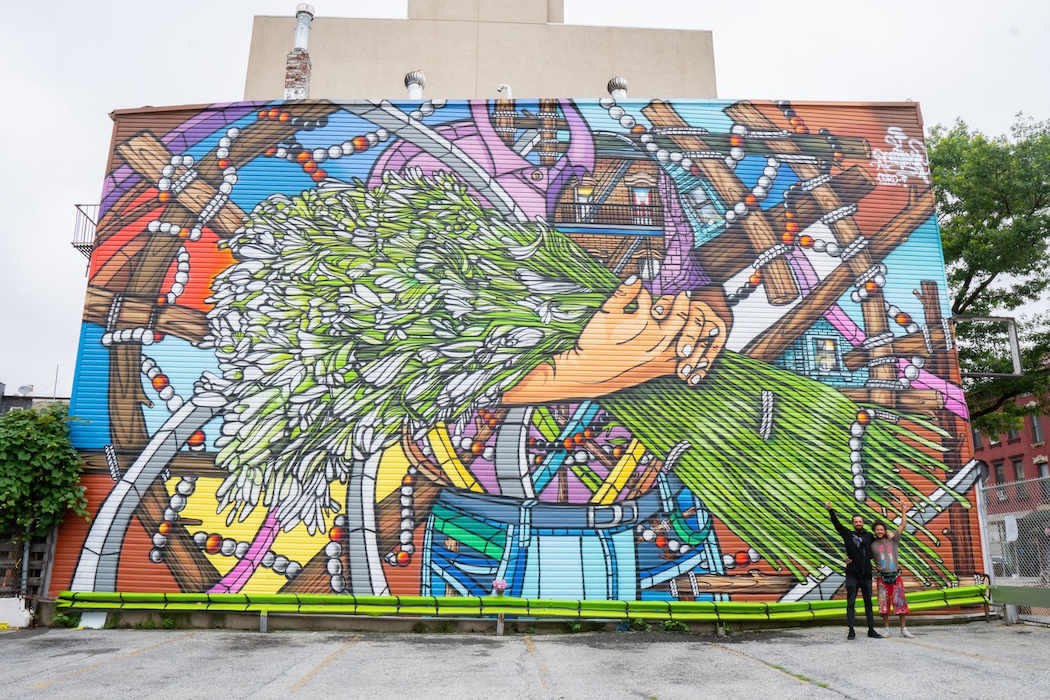 The Grand Street BID added murals in the district, including "Olor a Azucenas el Perfum del Barrio" by Don Rimx. The Grand Street BID added murals in the district, including "Olor a Azucenas el Perfum del Barrio" by Don Rimx.