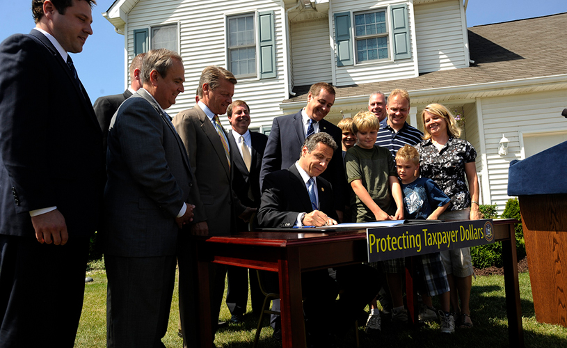 Andrew Cuomo signing bill