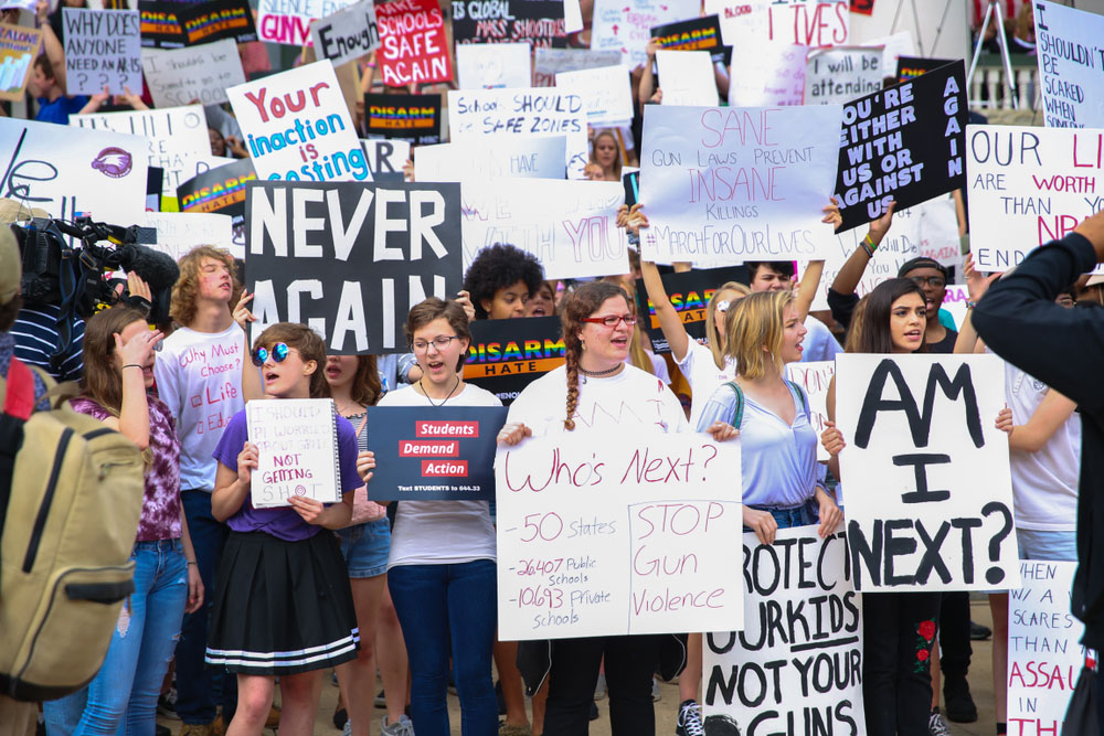 Huge crowd participated at "Never Again" rally to protest and change gun laws after the shooting at Marjory Stoneman Douglas High School. Huge crowd participated at "Never Again" rally to protest and change gun laws after the shooting at Marjory Stoneman Douglas High School.