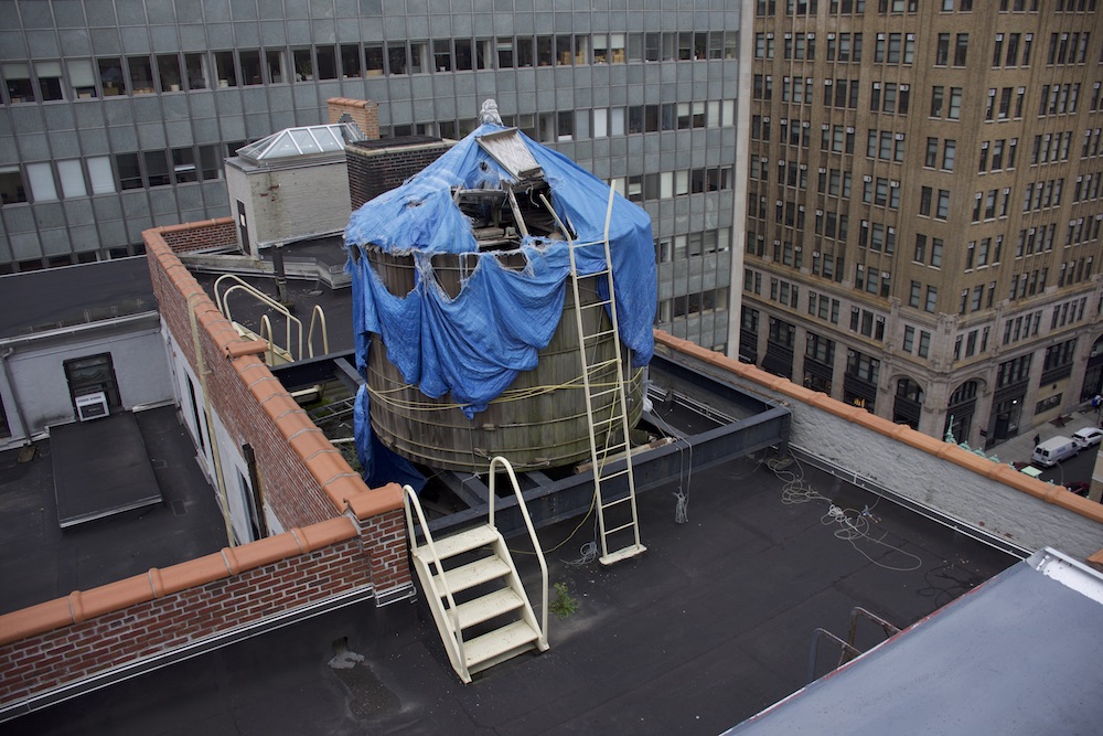 The drinking water supply for offices of the New York City Department of Sanitation doesn’t even have a roof – just a tattered tarp. The drinking water supply for offices of the New York City Department of Sanitation doesn’t even have a roof – just a tattered tarp.